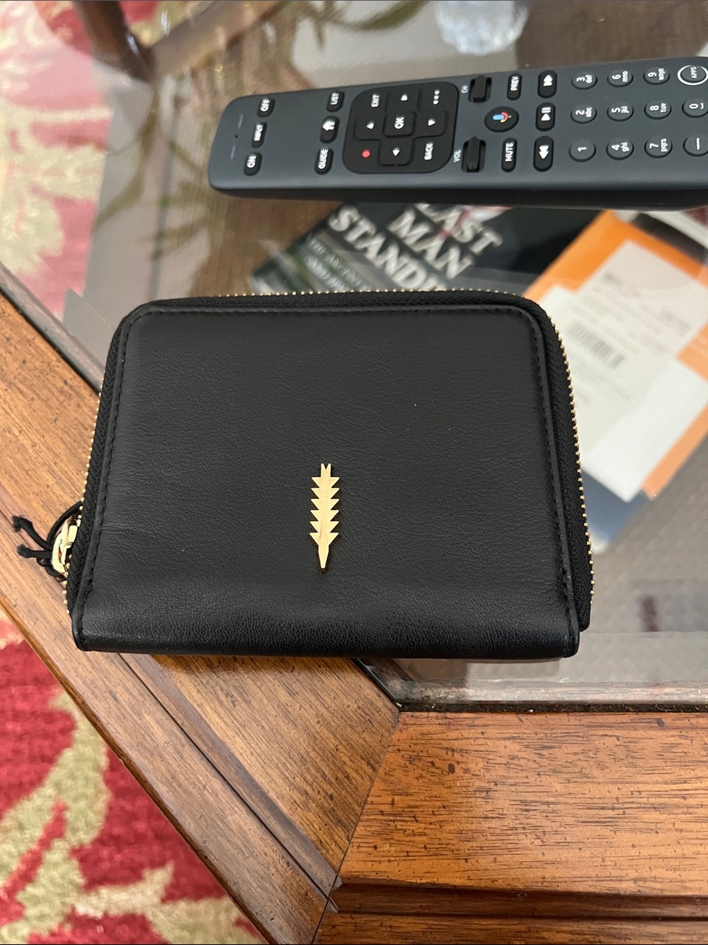 Thacker, Black Leather Zip Wallet with Golden Accent